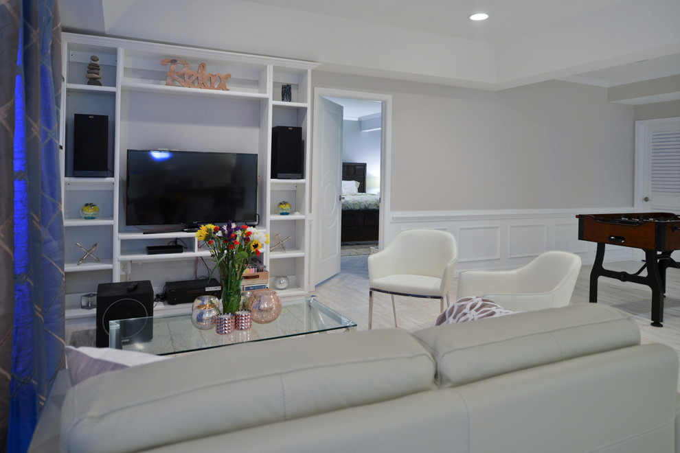 Inspiration for a mid-sized transitional walk-out basement remodel in DC Metro with white walls