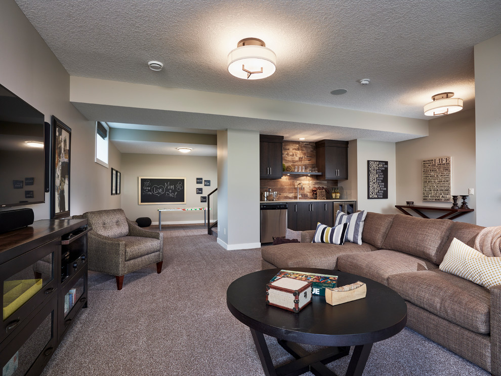 Medium sized classic walk-out basement in Calgary with beige walls, carpet and no fireplace.