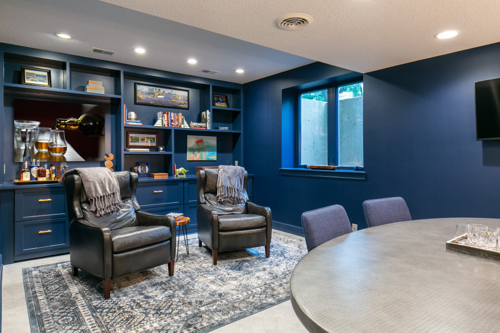 Basement game room - mid-sized underground vinyl floor and wallpaper basement game room idea in Kansas City with blue walls