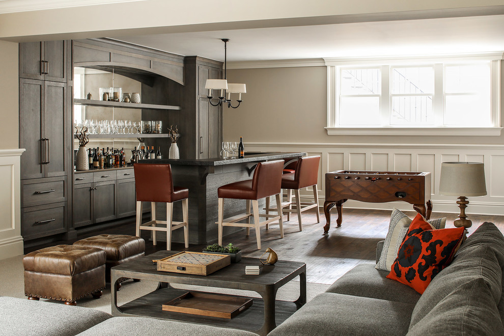 Elegant look-out dark wood floor and brown floor basement photo in New York with beige walls