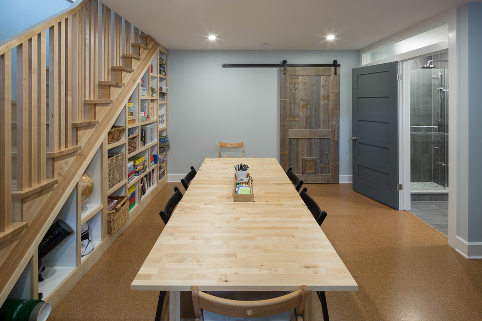 Inspiration for a mid-sized transitional cork floor basement remodel in Ottawa with gray walls