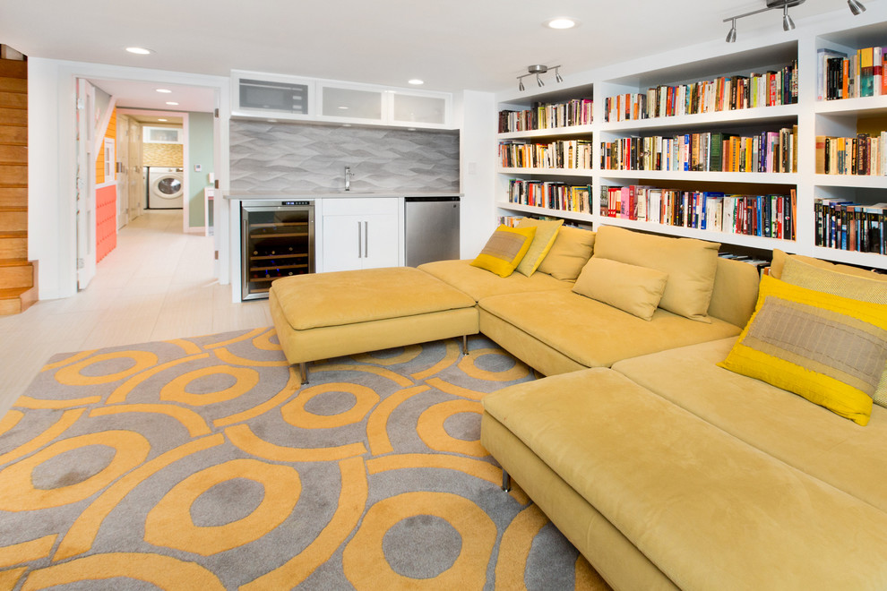 This is an example of a large contemporary walk-out basement in DC Metro with white walls.