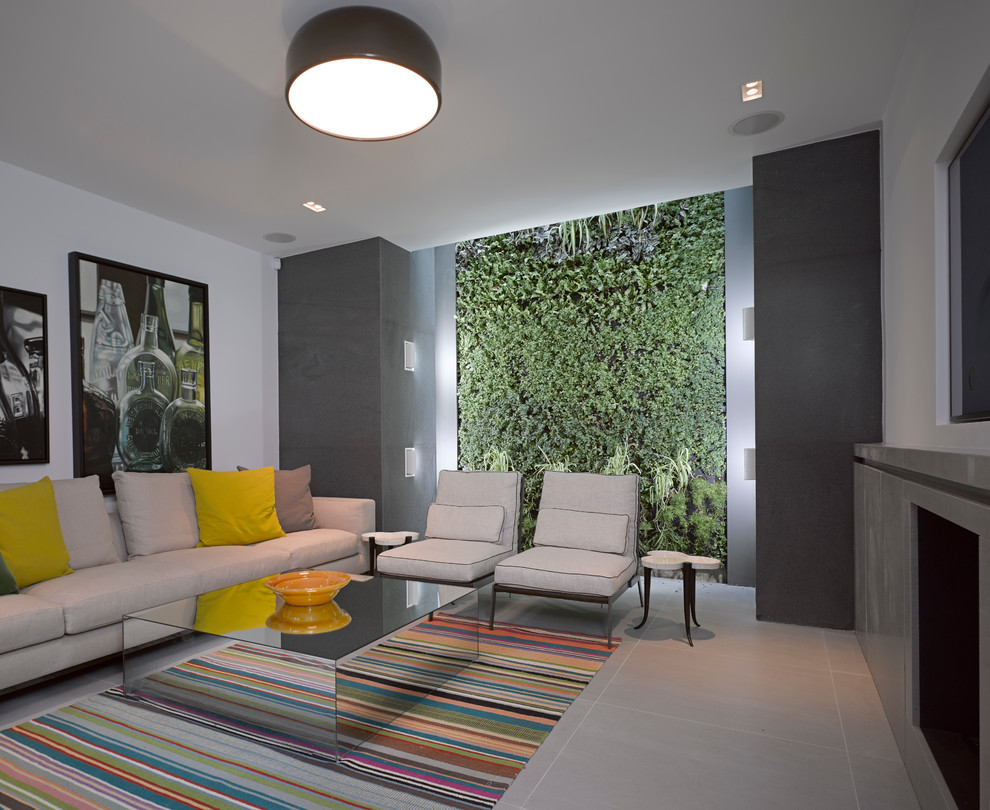 Idéer för ett modernt vardagsrum, med vita väggar, klinkergolv i keramik, en standard öppen spis och grått golv