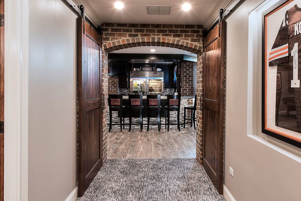 Design ideas for a large rustic look-out basement in Chicago with grey walls and carpet.