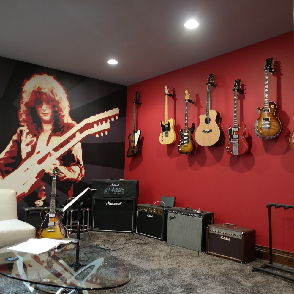 Mid-sized eclectic underground carpeted basement photo in Chicago with red walls