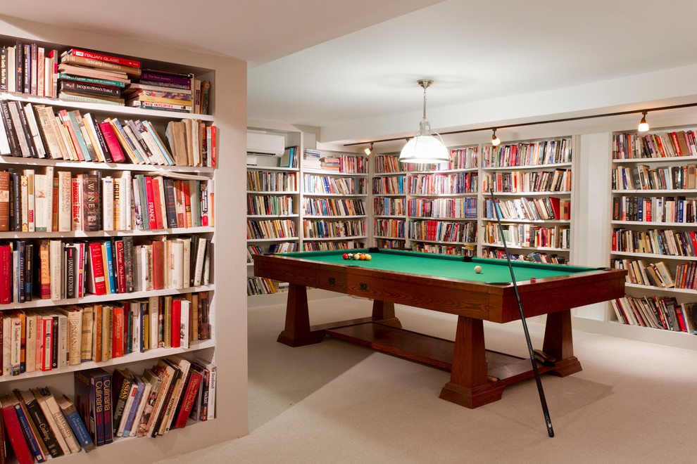 Inspiration for an eclectic games room in New York with carpet.