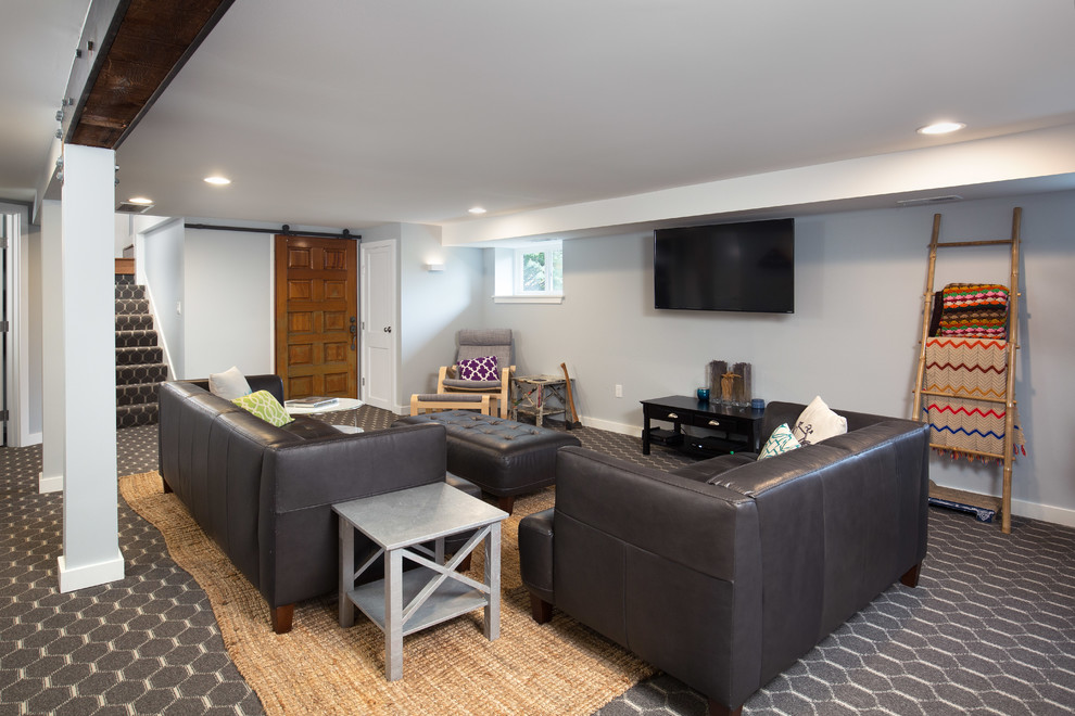 Inspiration for a mid-sized transitional look-out carpeted and gray floor basement remodel in Seattle with gray walls