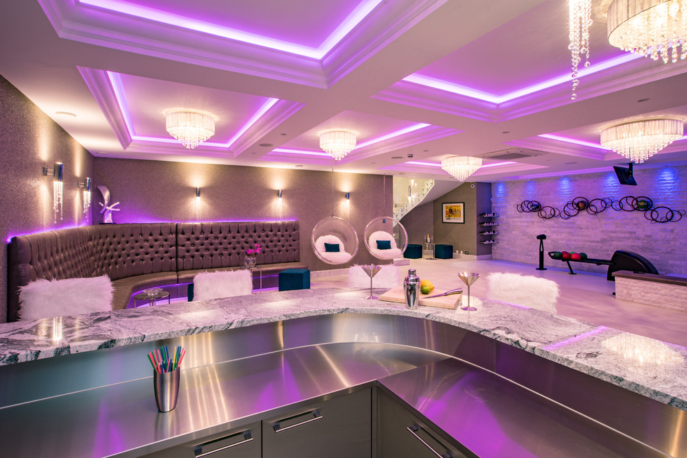 This is an example of a contemporary basement in Buckinghamshire with multi-coloured walls.