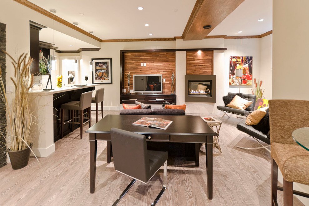 Inspiration for a contemporary light wood floor and beige floor living room remodel in Vancouver with white walls, a standard fireplace and a metal fireplace