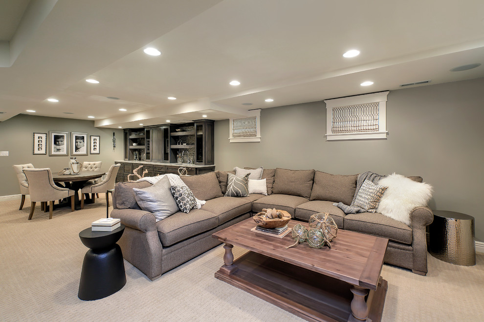 Basement - transitional carpeted basement idea in Chicago with gray walls