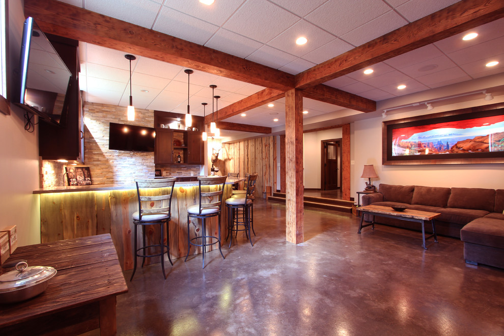 Open concept basement with lots of natural texture - Rustic - Basement