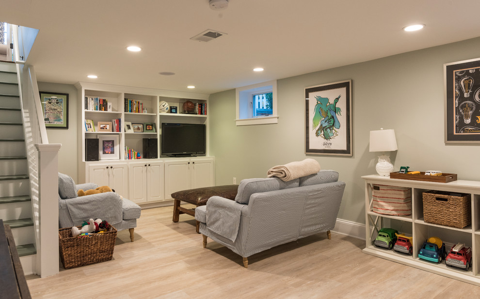 Basement - mid-sized transitional look-out brown floor and light wood floor basement idea in DC Metro with green walls and no fireplace