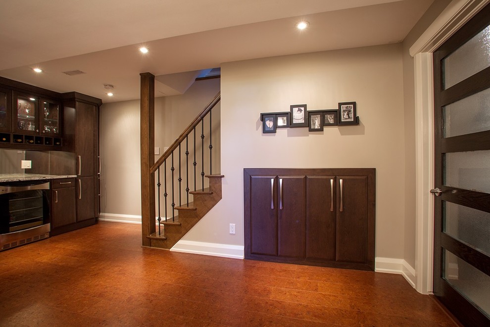 Medium sized traditional look-out basement in Ottawa with grey walls, cork flooring and no fireplace.
