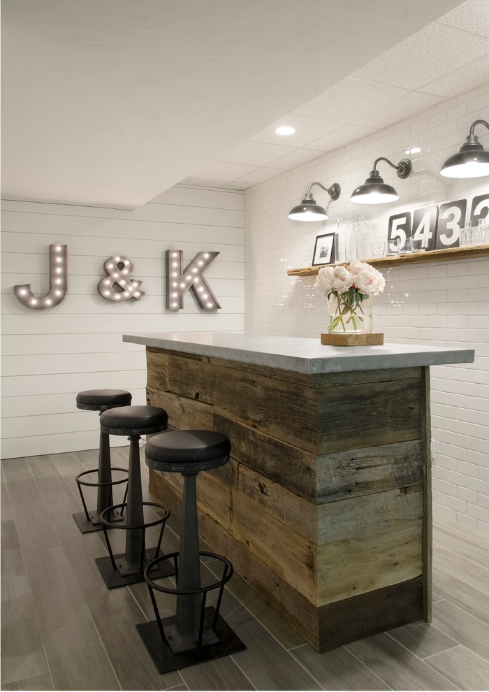 Large country look-out porcelain tile basement photo in Boston with white walls and no fireplace