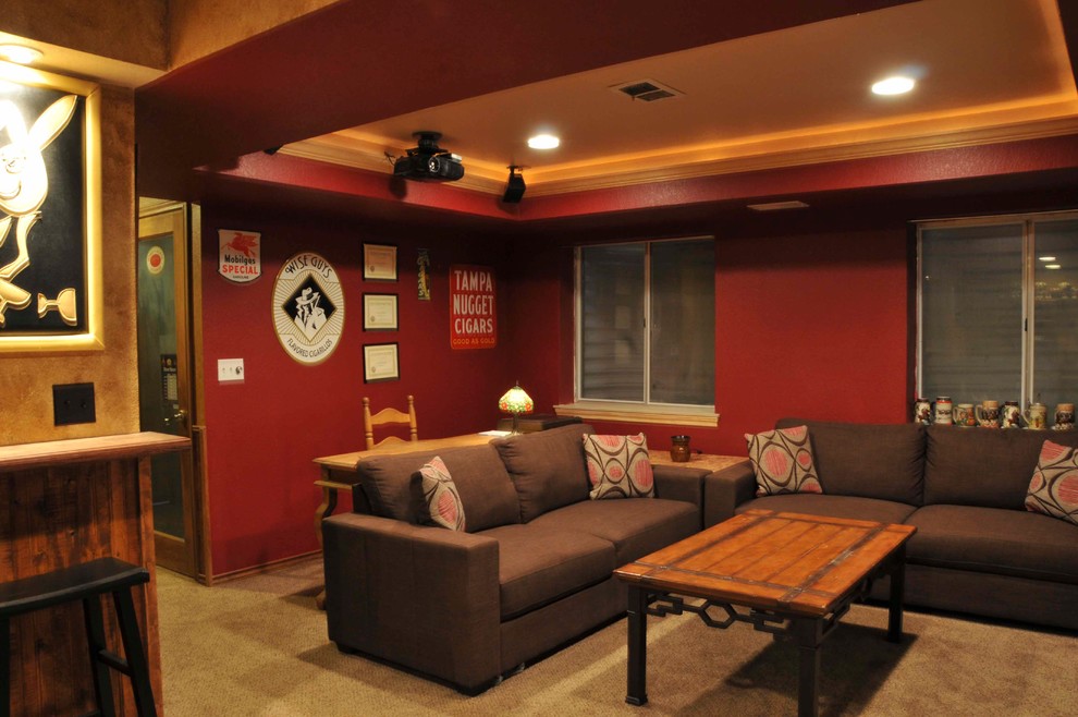 Inspiration for a timeless underground carpeted and beige floor basement remodel in Denver with red walls