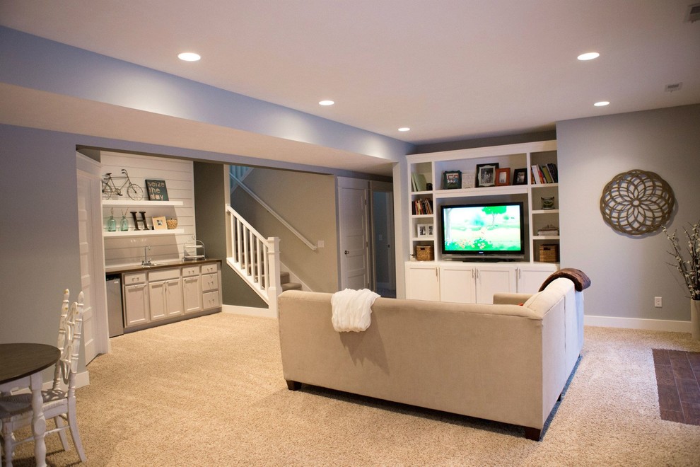 Basement - mid-sized craftsman walk-out carpeted basement idea in Grand Rapids with gray walls and no fireplace