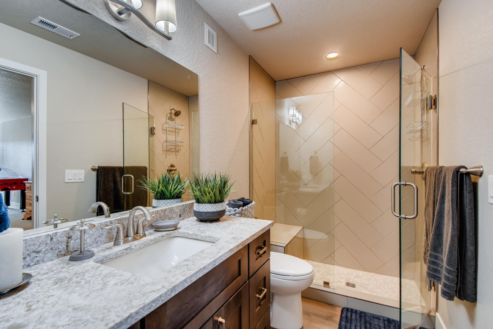Bathroom - huge rustic laminate floor bathroom idea in Denver with beige walls