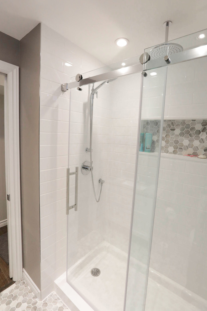 Bathroom - large contemporary laminate floor and brown floor bathroom idea in Toronto with beige walls