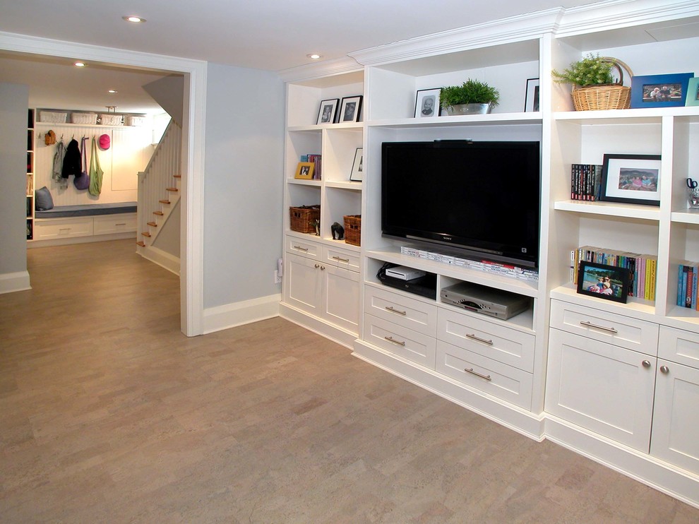Example of a large transitional brown floor basement design in Toronto with gray walls and no fireplace