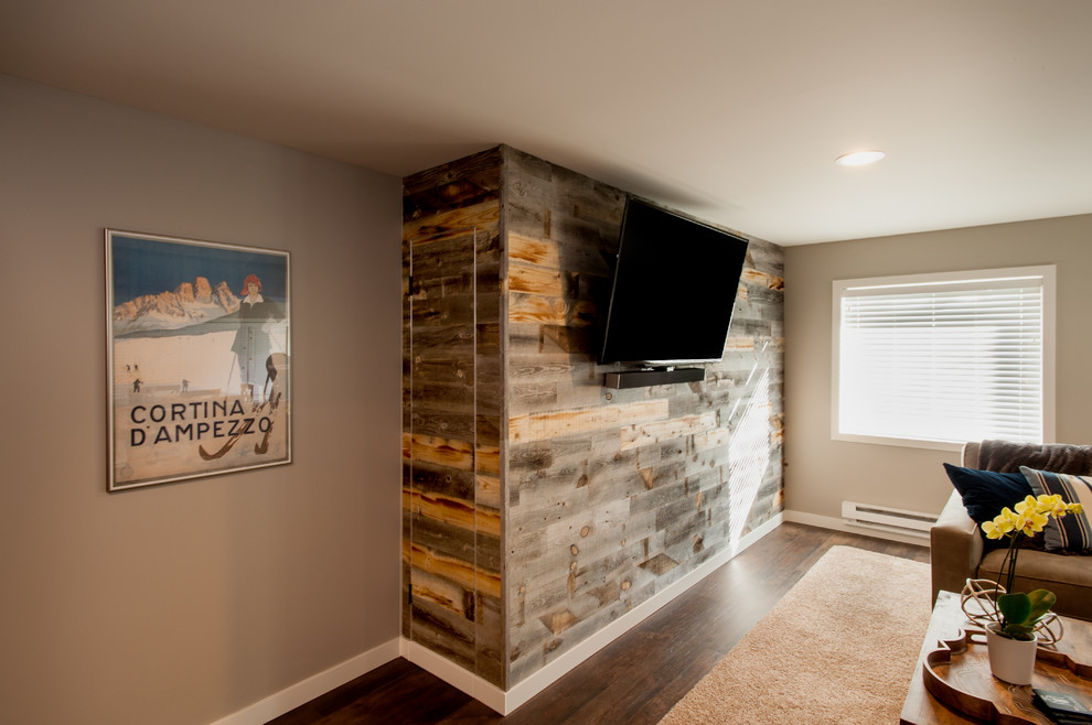 Exemple d'un sous-sol tendance donnant sur l'extérieur et de taille moyenne avec un mur gris, un sol en vinyl et aucune cheminée.