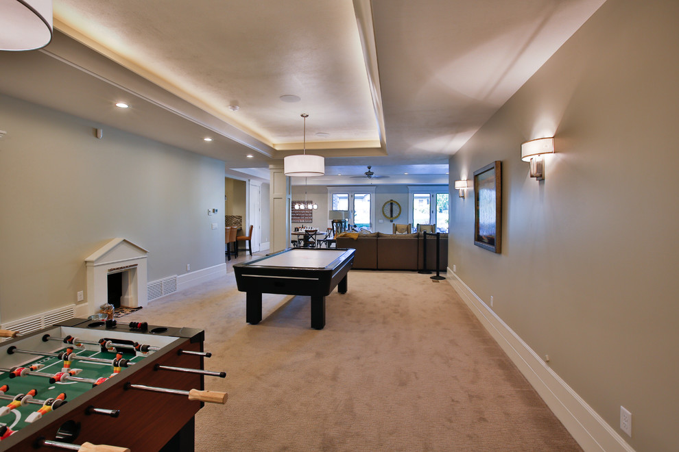 Inspiration for a large traditional walk-out basement in Salt Lake City with beige walls and carpet.
