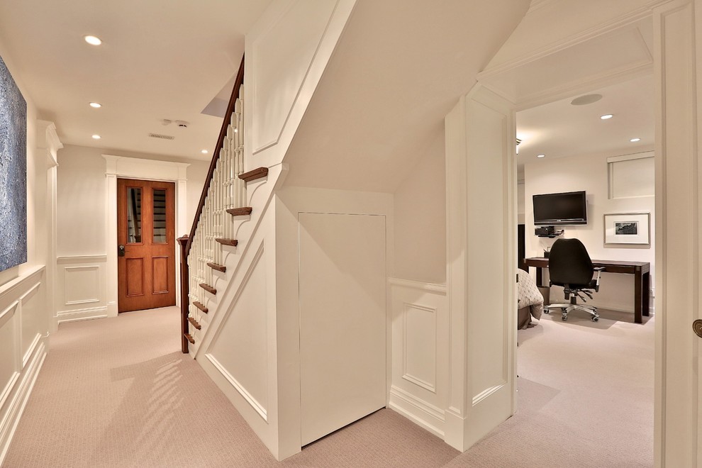 Photo of a large contemporary walk-out basement in Toronto with white walls, carpet and no fireplace.