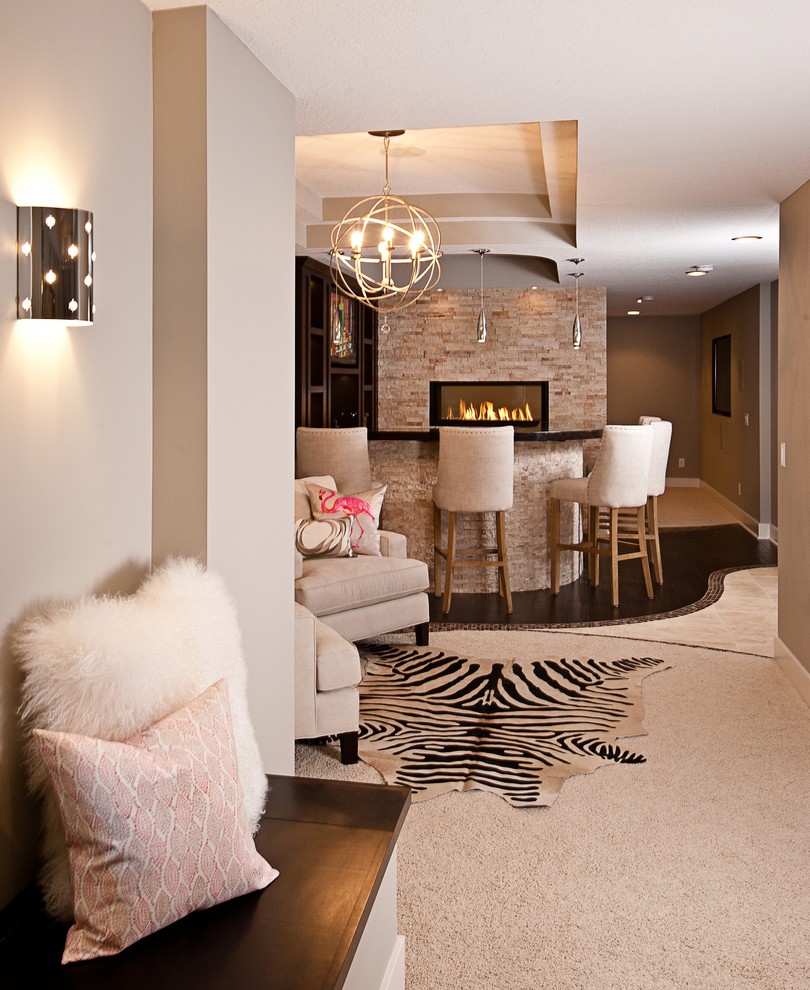 Example of a large trendy look-out dark wood floor and brown floor basement design in Minneapolis with gray walls, a two-sided fireplace and a tile fireplace