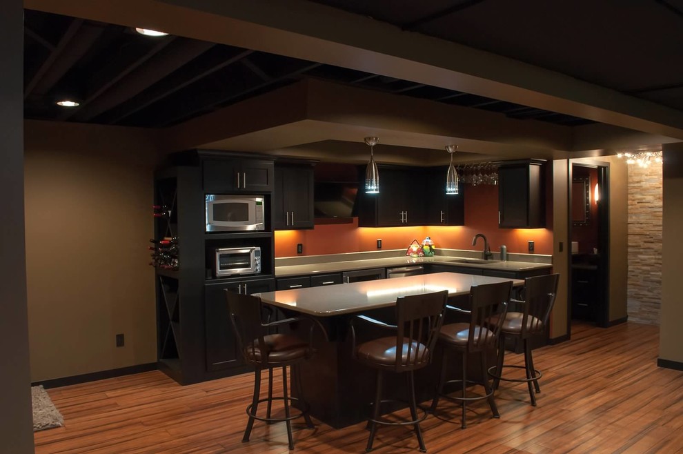 Inspiration for a timeless orange floor basement remodel in Minneapolis