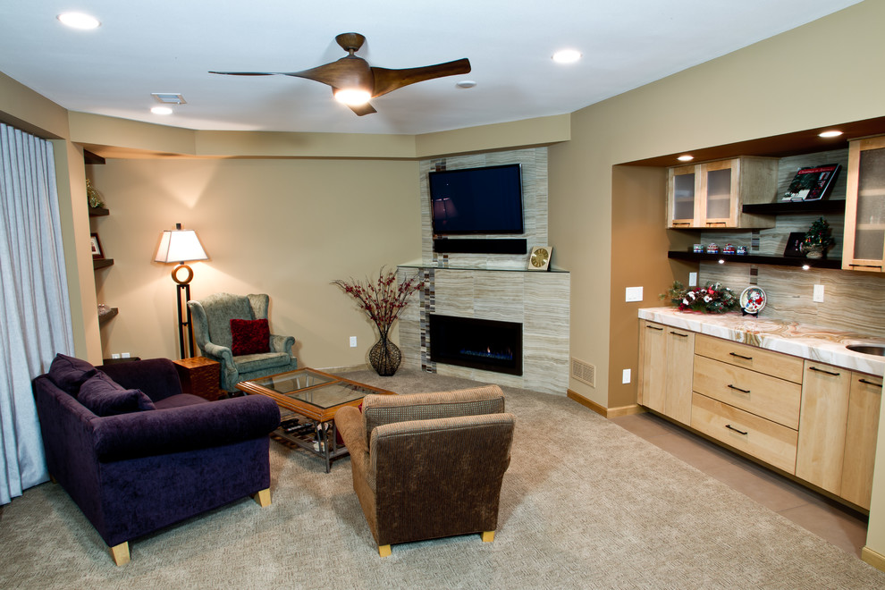 This is an example of a medium sized classic fully buried basement in Other with a standard fireplace, beige walls, carpet and a tiled fireplace surround.