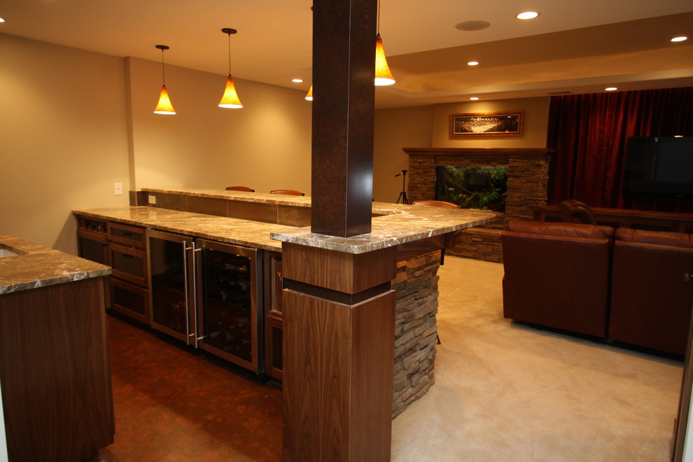 Basement - mid-sized transitional walk-out carpeted basement idea in Minneapolis with beige walls and a stone fireplace