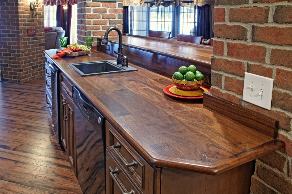 Elegant brown floor kitchen photo in Detroit