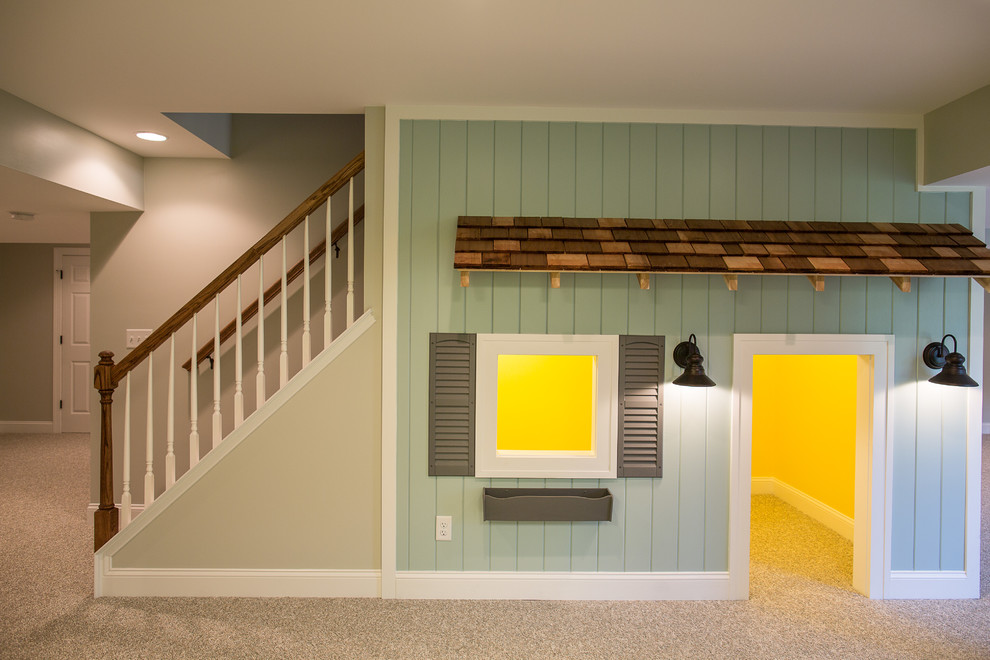 Idée de décoration pour un grand sous-sol minimaliste enterré avec un mur vert, moquette et aucune cheminée.