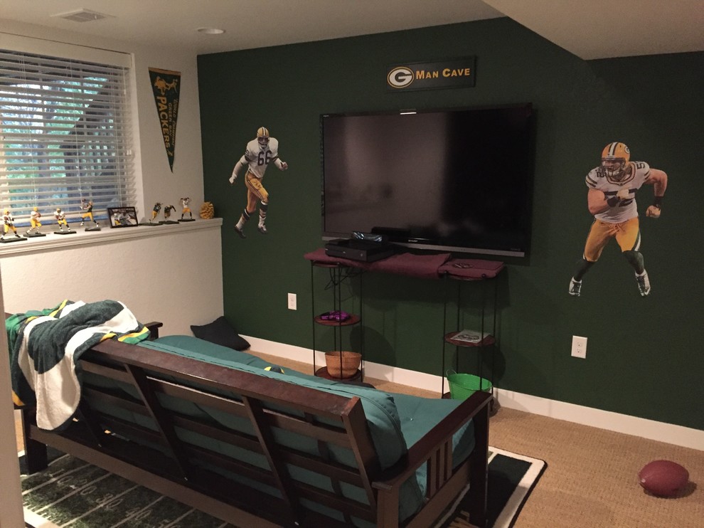 Inspiration for a large contemporary carpeted basement remodel in Milwaukee with green walls and no fireplace