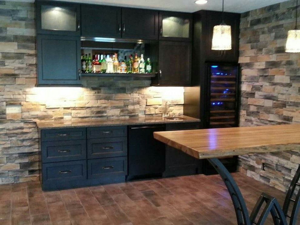 Example of a mid-sized look-out porcelain tile and brown floor basement design in Omaha with multicolored walls and no fireplace