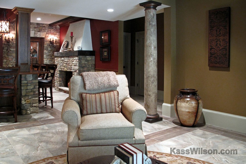 Inspiration for a large timeless basement remodel in Atlanta with red walls, a standard fireplace and a stone fireplace