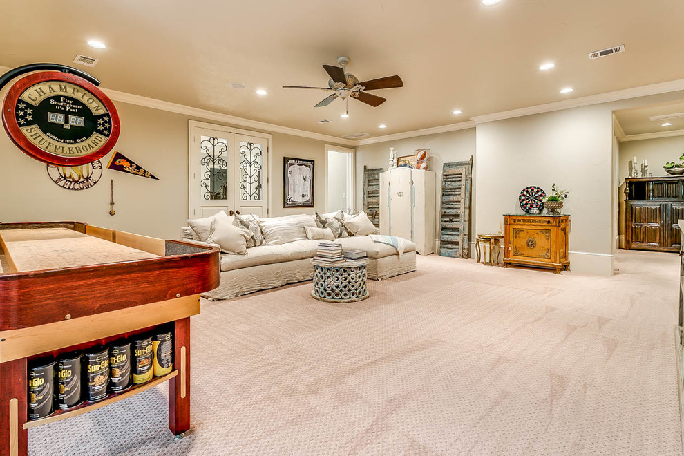 Huge elegant look-out carpeted and beige floor basement game room photo in Dallas with beige walls