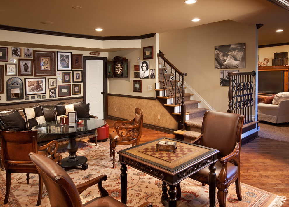 Example of a classic look-out medium tone wood floor and orange floor basement design in Columbus with beige walls and no fireplace