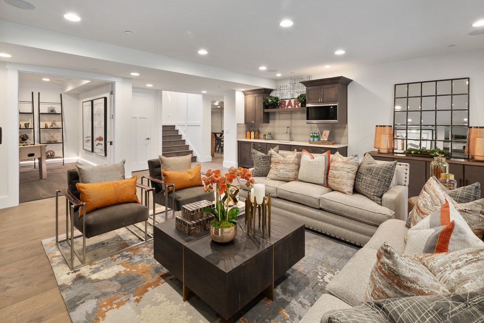 Large transitional open concept medium tone wood floor and brown floor living room photo in Seattle with white walls