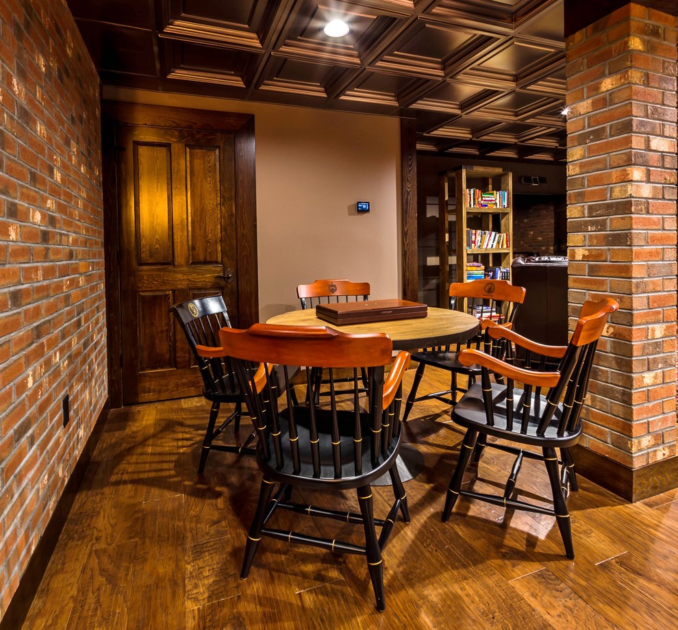 This is an example of a large rustic fully buried basement in New York with beige walls, medium hardwood flooring, no fireplace and yellow floors.