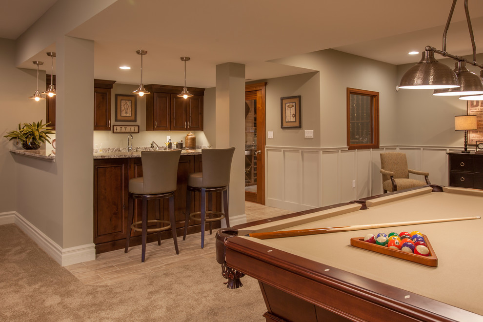 Inspiration for a huge contemporary walk-out carpeted basement remodel in St Louis with beige walls