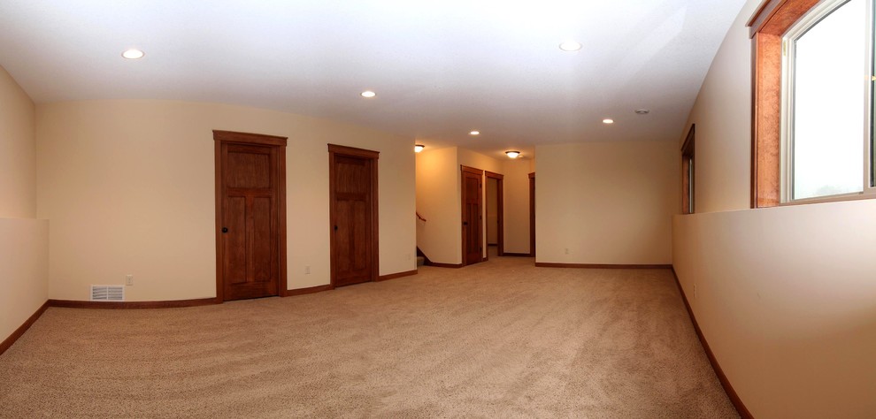 Example of an arts and crafts basement design in Minneapolis