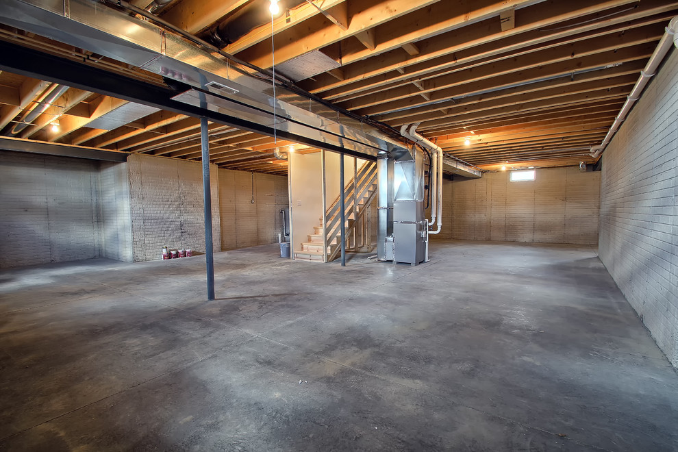 Inspiration for a timeless concrete floor basement remodel in Columbus