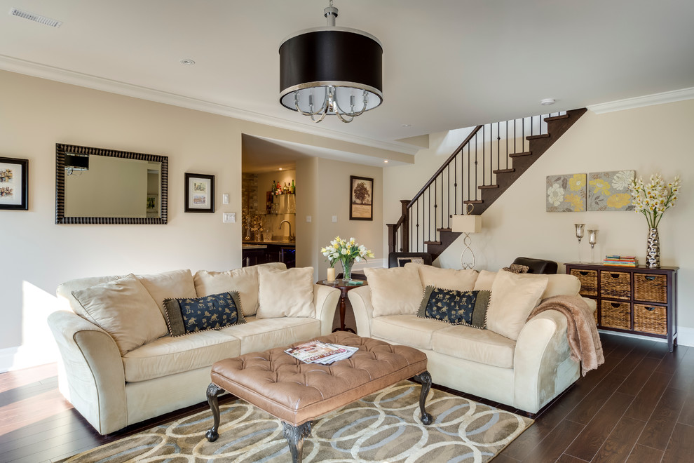 Elegant look-out dark wood floor and brown floor basement photo in Vancouver with beige walls