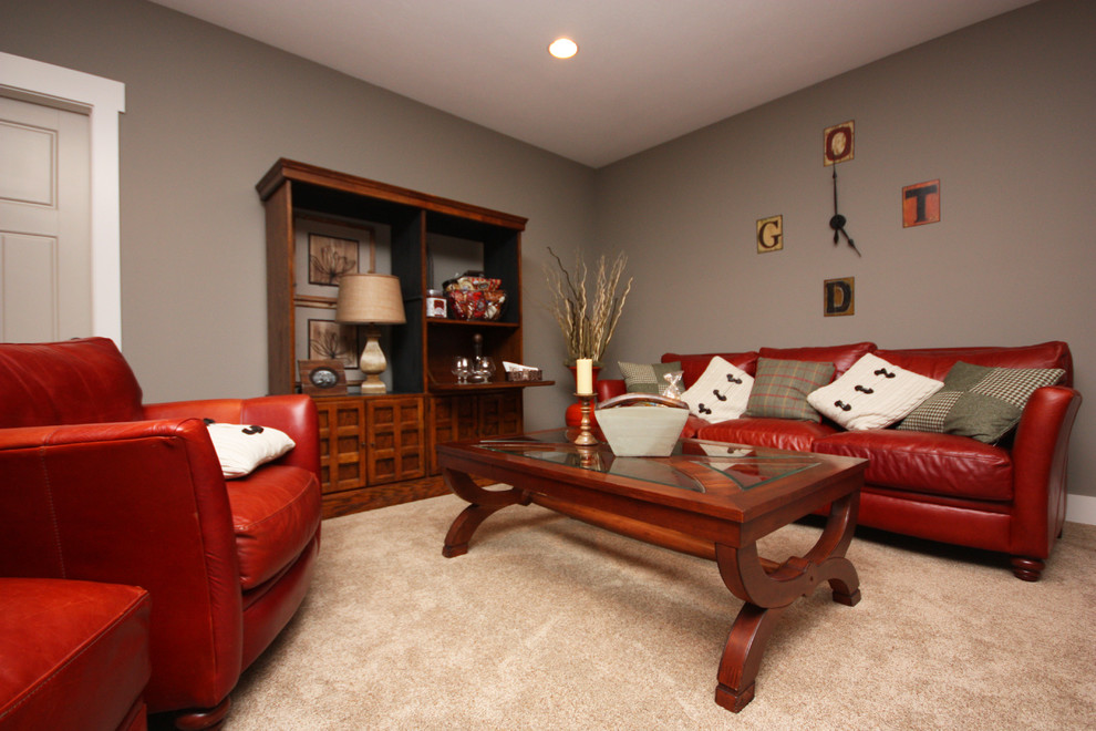Design ideas for a traditional look-out basement in Indianapolis with grey walls and carpet.