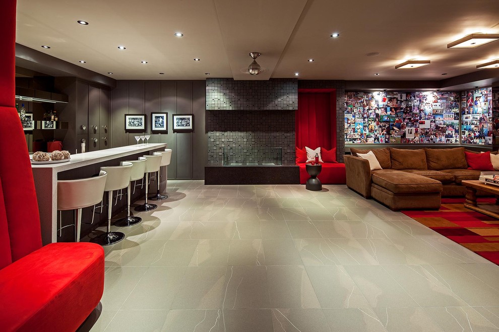 Inspiration for a contemporary underground ceramic tile and gray floor basement remodel in Toronto with gray walls and no fireplace