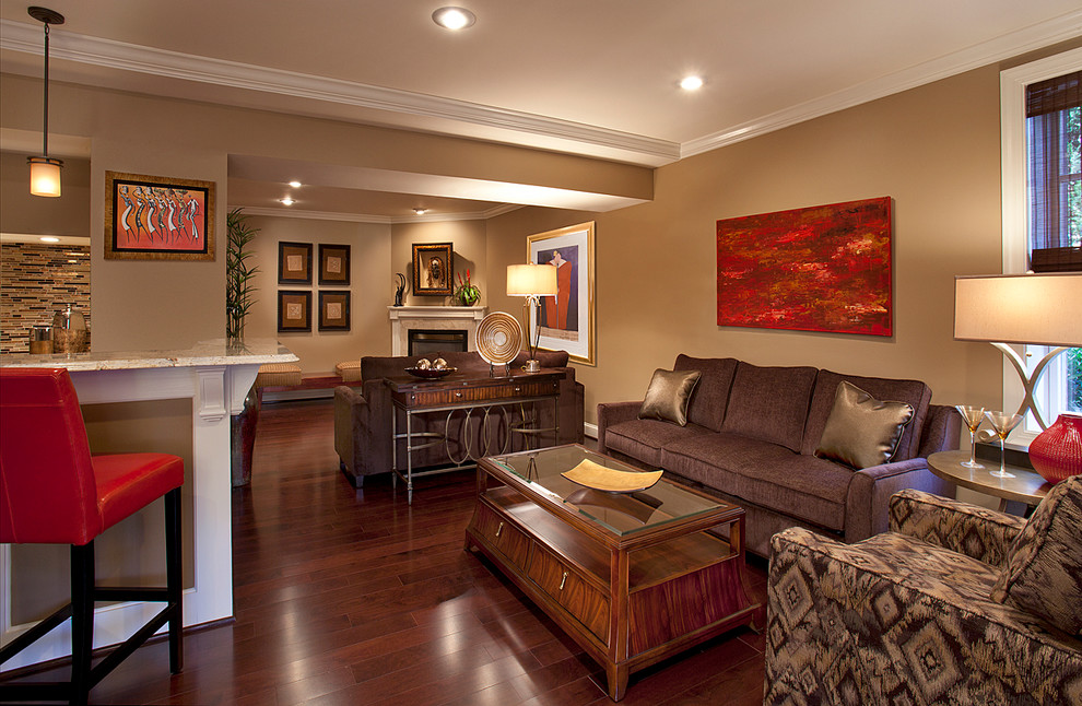 Inspiration for a large contemporary walk-out medium tone wood floor basement remodel in DC Metro with brown walls