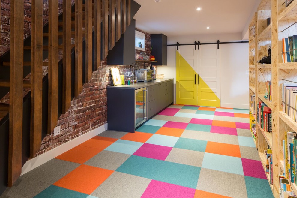 Basement - large eclectic look-out carpeted and multicolored floor basement idea in Calgary with gray walls