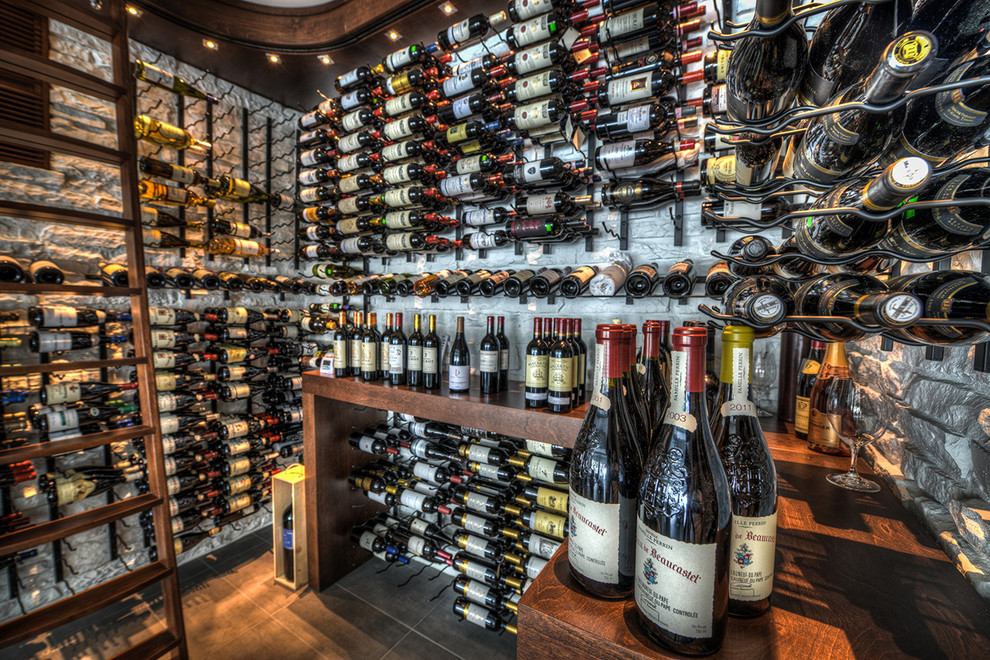 Walkin wine cellar with metal rack and custom woodwork Contemporary