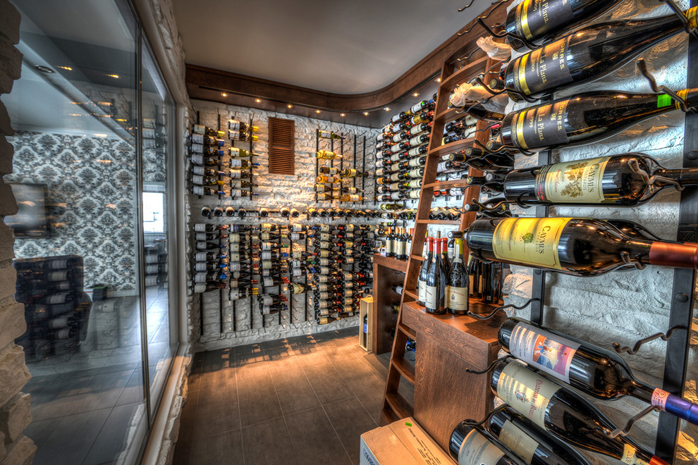 Walkin wine cellar with metal rack and custom woodwork Contemporary Wine Cellar Other