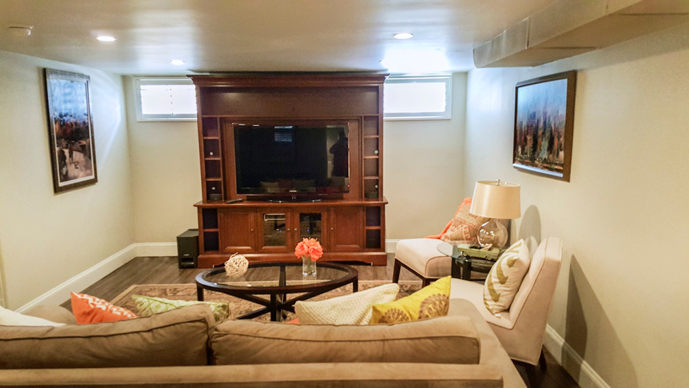Example of a mid-sized classic look-out carpeted basement design in Denver with beige walls and no fireplace